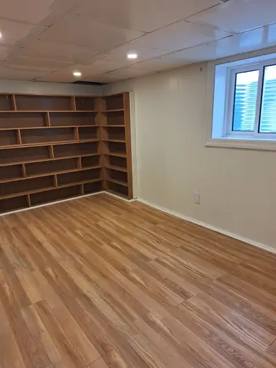 Enjoy a private lower-level living space with two generously sized rooms, a private bathroom (with s...