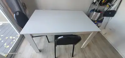 White dining table for sale with 4 chairs. $ 50, View more