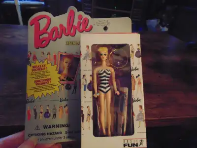 Sealed Barbie Key Chain, Sealed Kermit the frog in car, Sealed Jughead figurine.( has ripped paper)....