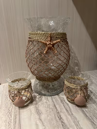 Three piece candle holder set. Great used condition. The set has only been sitting on a shelf, never...