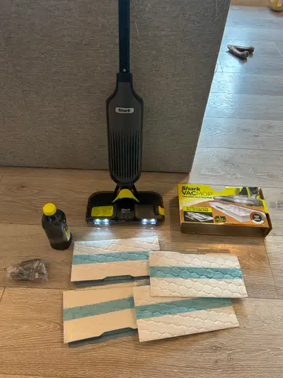 New condition unused, retail price $120 before tax. Pick up in Reunion Airdrie Shark VACMOP™ Cordles...