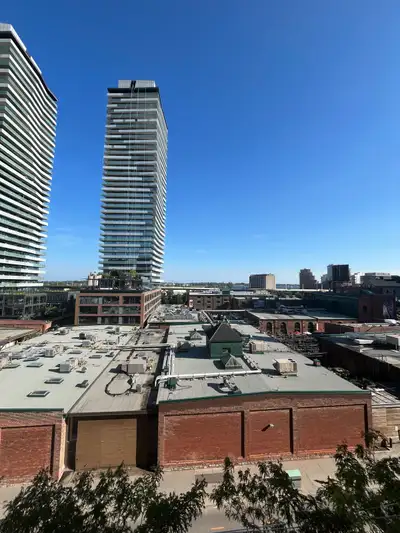 A spacious primary bedroom is available in a stunning 1200 sq ft condo in the heart of Toronto's Dis...