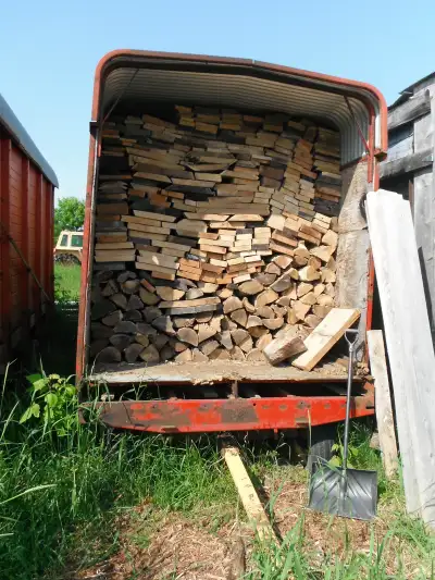 20 cords dry hardwood firewood (mostly ash) for sale. In mobile storage shed. Wood, $3000.00, mobile...