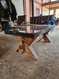 Heavy timber coffee table with resin top coat.
