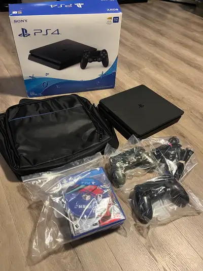 PS4 Slim 1-TO, manettes, jeux et sac, View more