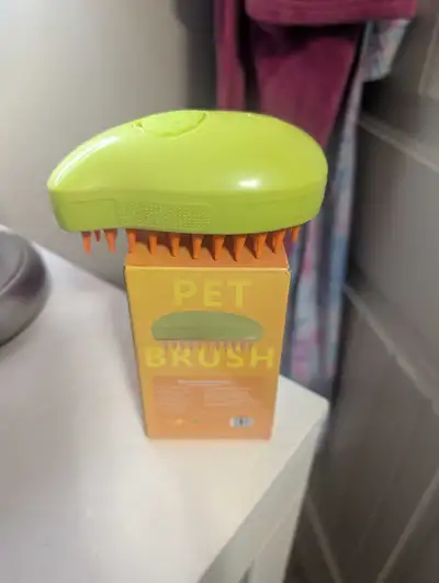 PET MASSAGING SPRAY BRUSH, View more