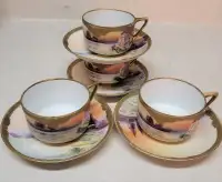 4 individual Nippon teacups and saucers with garden scenes