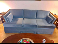Vintage MCM pullout sofa with teak accents 