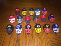 17 NHL Gumball Machine Goalie Masks.