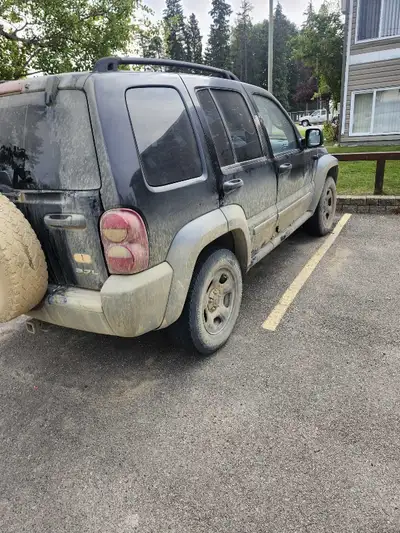 2006 jeep liberty sport looking you trade for a 4x4 truck or bigger suv or 2500 obo