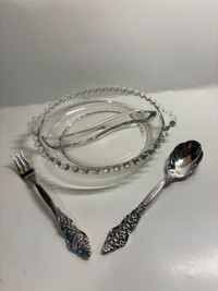 Candlewick divided serving dish with silver fork and spoon.