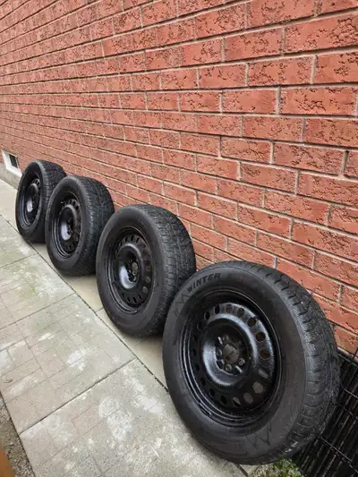 Set of 4 MotoMaster Winter Edge tires on 5x114.3 rims. Tires have a season or two left, as shown in...