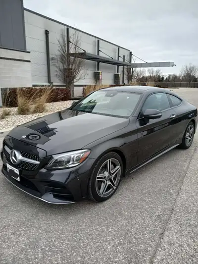 2019 Mercedes-Benz C300 4MATIC Coupe. Graphite Grey Metallic. Only 60,415 KM. Remaining Mercedes CPO...