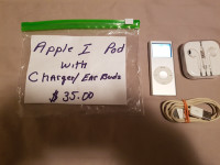 APPLE I POD WITH CHARGER AND EAR BUDS