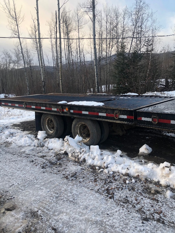 Trail king tandem dually air brake tilt deck Heavy Equipment