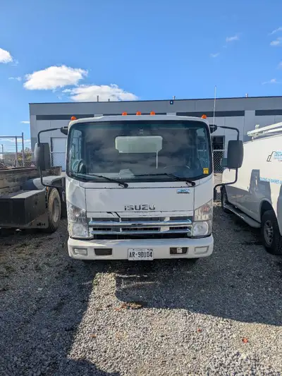 2015 Isuzu diesel equipped with aluminum dump and tool box. Everything works. Original owner, fleet...