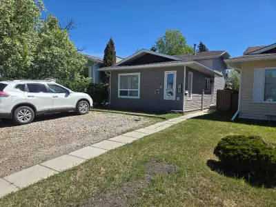 3 bedroom 2.5 bath 4 level split house in Rosedale Red Deer. Main floor has open kitchen/sitting roo...