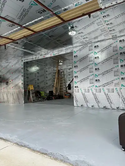 T Hangar Burlington Executive Airport New concrete and paved taxiway July 2025 Insulated Painted flo...