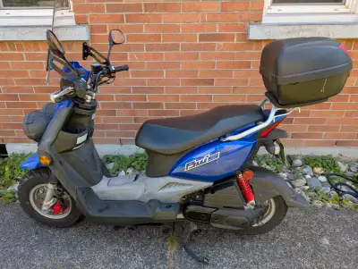 Yamaha BWs 49cc gas scooter with additional accessories included. Runs well and is super cheap to ru...