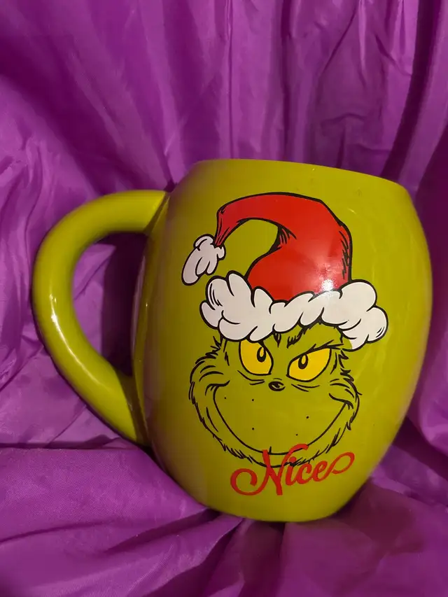 Brand new ceramic oval Grinch Mug