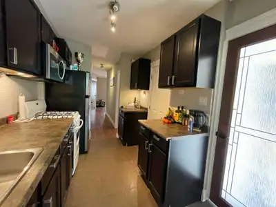 A cute. renovated, bright and spacious 2 bdrm apt with hardwood floor, gas stove, separate dining/li...