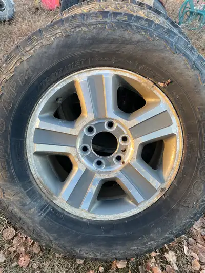 typical used 6 bolt ford rim for f150 and the spare tire rim . no rim damage, usual peeling clear co...