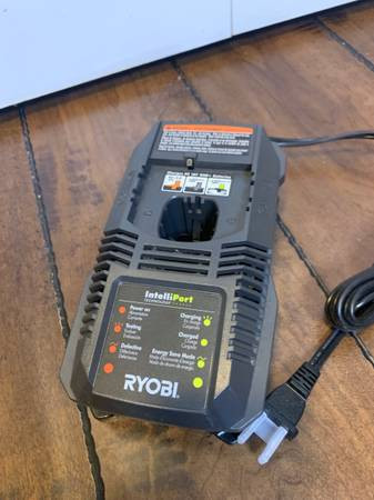New Ryobi 18 Volt P118 Intelliport Dual Technology Battery Charg in Hand Tools in Burnaby/New Westminster