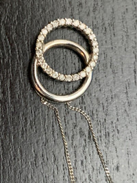 Women’s silver necklace with 2 diamond encrusted hoops