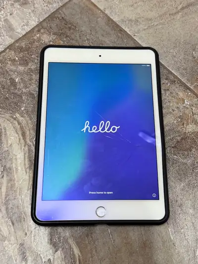 Screen is broken but the iPad still works Case included No USB cord included