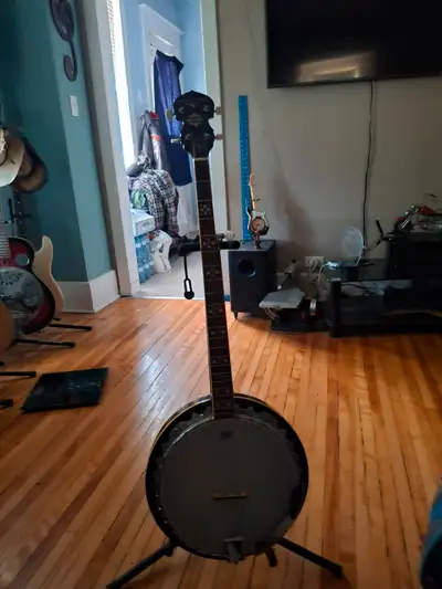 Hi I have a left handed banjo , with case and stan for sale. i am asking 250.00 firm pick up only th...