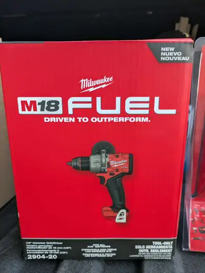 Milwaukee hammer drill with one battery and charger, View more