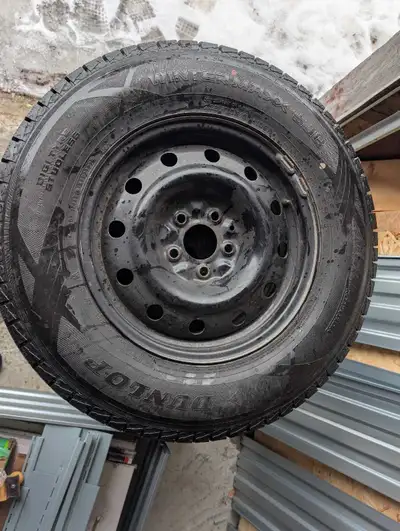 I'm offering a set of four winter tires mounted on rims, size 235/70R16. These Dunlop Winter Maxx ti...