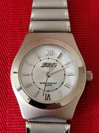 VINTAGE 1980'S, SOLO STAINLESS STEEL WRIST WATCH!!!