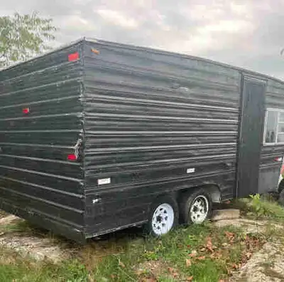 Homemade toy hauler tandem axle solid frame has brakes but they need work. ramp door on the back new...
