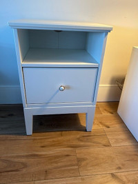 Two white wooden nightstands for sale. Like new. $40.00 each.