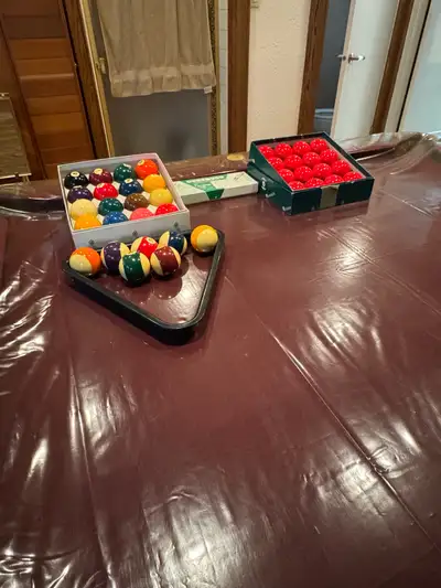 Elevate your game room with this comprehensive set of used pool table accessories! This collection i...