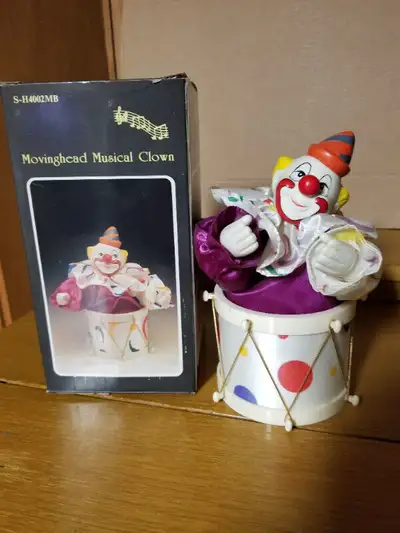 Musical Clown in drum, View more