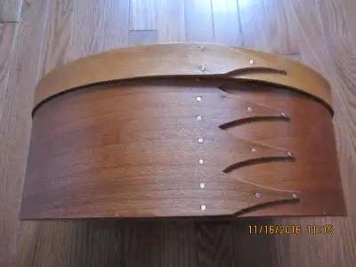Beautiful larger shaker box constructed of cherry wood by Orleans Carpenters of Mass. Dimensions 14....