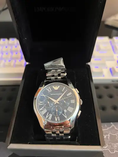 Brand new never worn. Battery is dead. Has original tag and plastic, box, and instructions.