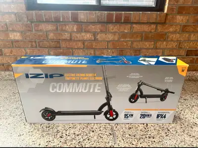 Selling my iZip Commute Electric Folding Scooter, which is perfect for zipping around town with a ma...
