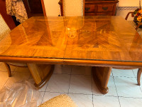 Wood Dinner Table with extension leaf and 5 wooden chairs.