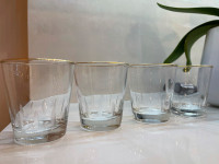 4 beautiful vintage glasses with etching detail and gold rim