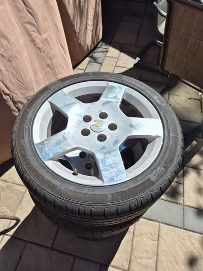 Brand new Roadmarch UHP tires mounted on chevrolet Cobalt wheels. Will fit other Chevrolet vehicles...