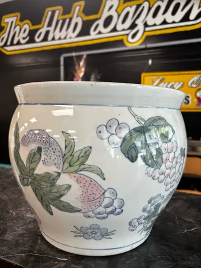 This is a beautiful, used Chinese Planter featuring a decorative floral design. It's perfect for add...