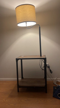 Lamp with buit in table