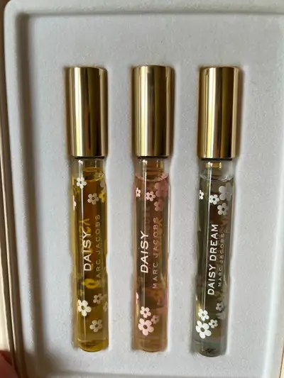 Set of Daisy original, Daisy Eau So Fresh, and Daisy Dream by Marc Jacobs. Rollerball applicators, a...