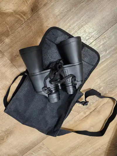 Model 12 x 50, 275 ft at 1000 yds coated optics with case.
