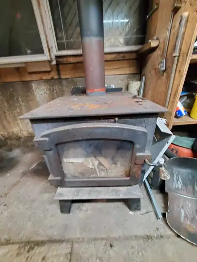 Big Wood stove and chimney, View more