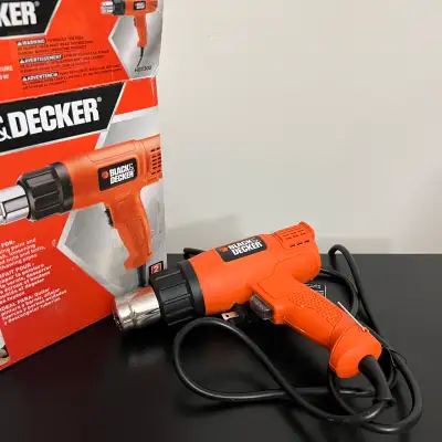 This BLACK+DECKER Heat Gun, model HG1300, features dual temperature settings for versatile use in va...