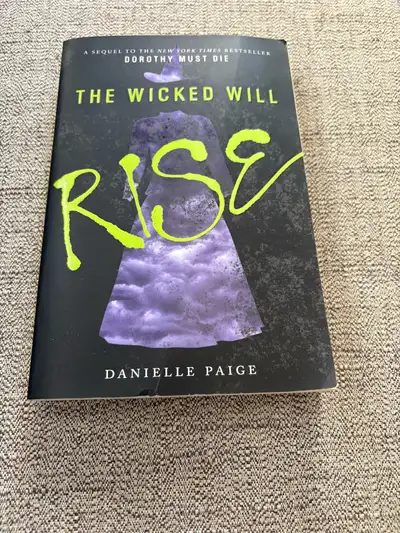 The Wicked Will Rise Over Sized Soft Cover Book in good condition from a smoke free home $5.00 Pick...